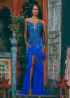 Turquoise/Royal ASHLEYlauren 11438 glamorous gown featuring a sweetheart illusion V-neckline, ornate bead pattern, striking V-back, tiered ruffle skirt, and a center slit with tulle details for an elegant and dramatic look.