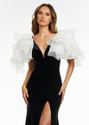 Front. Black/Ivory ASHLEYlauren 11172 Velvet Gown with V-Neckline, V-Back, Contour Seaming, Multi-Tiered Organza Shoulder Ruffles, and Left Leg Slit.