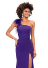 Front. Black Orchid ASHLEYlauren 1129 one shoulder scuba gown featuring feather-embellished neckline, heat set stones cascading down the skirt, and a left leg slit for a bold and elegant look.