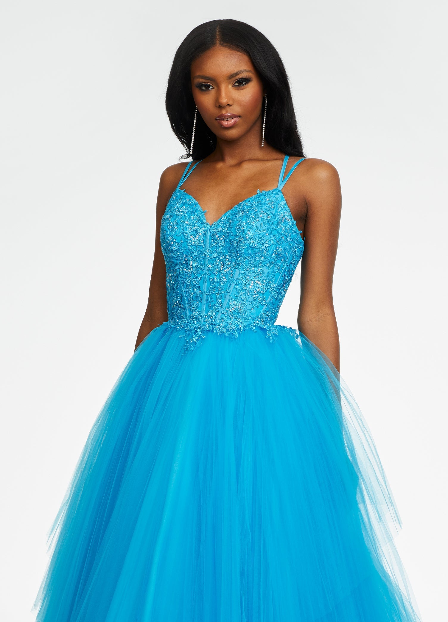 Front. Blue ASHLEYlauren 11146 Pleated Tulle Ball Gown with Spaghetti Straps, Embroidered Lace Bustier, Heat Set Stones, and Lace-Up Back