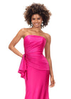 Front. Fuchsia ASHLEYlauren 11295 strapless jersey gown featuring a wrap bustier adorned with press-on stones, a knot detail at the waist, and a sweep train for a sleek and elegant silhouette.