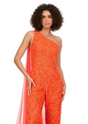 Front. Orange ASHLEYlauren 11384 eye-catching sequin jumpsuit featuring a one shoulder neckline, removable cape, open back with sequin straps, for a bold and glamorous statement look.