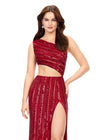 Front. Red ASHLEYlauren 11240 fully hand-beaded one shoulder gown featuring an intricate bead pattern designed to accentuate curves, a bold cut out detail, and a left leg slit for a striking and glamorous look.