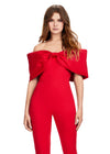 Front. Red ASHLEYlauren 11414 chic scuba jumpsuit featuring an off shoulder neckline with an oversized bow for a bold and sophisticated statement look.