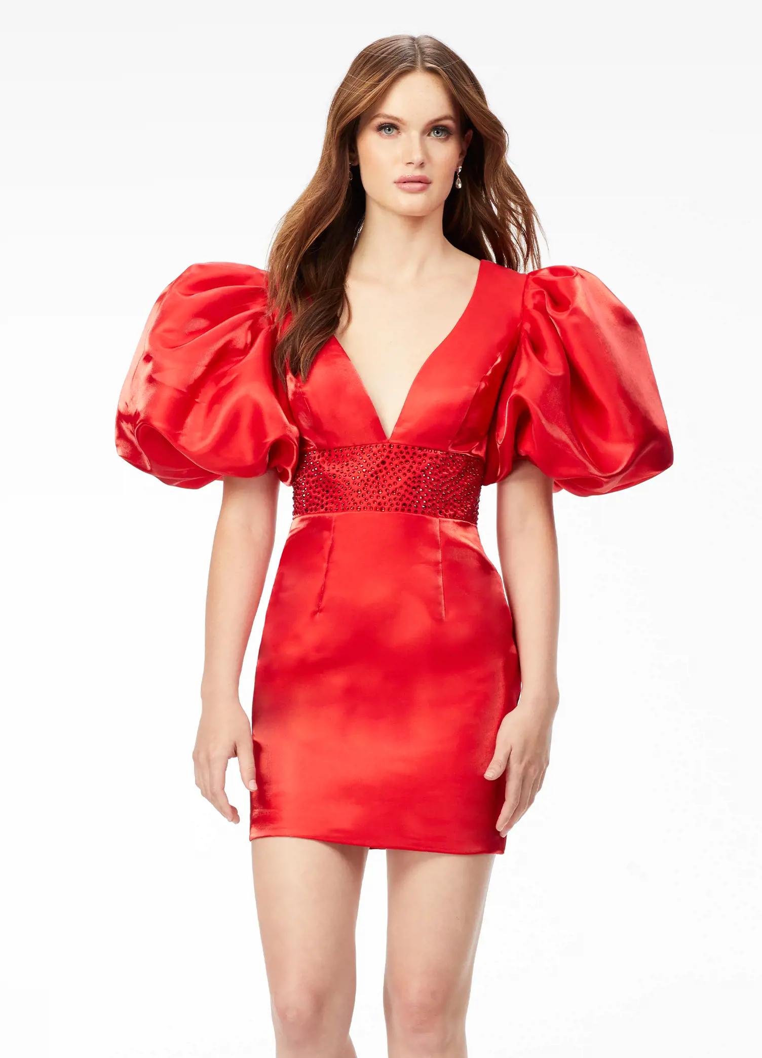 Front - Red ASHLEYlauren 4549 cocktail dress featuring a V-neckline, oversized puff sleeves, heat set stone-embellished waistband, fitted skirt, and center lace-up back for a bold and glamorous look.