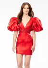 Front - Red ASHLEYlauren 4549 cocktail dress featuring a V-neckline, oversized puff sleeves, heat set stone-embellished waistband, fitted skirt, and center lace-up back for a bold and glamorous look.
