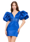Front - Royal ASHLEYlauren 4549 cocktail dress featuring a V-neckline, oversized puff sleeves, heat set stone-embellished waistband, fitted skirt, and center lace-up back for a bold and glamorous look.