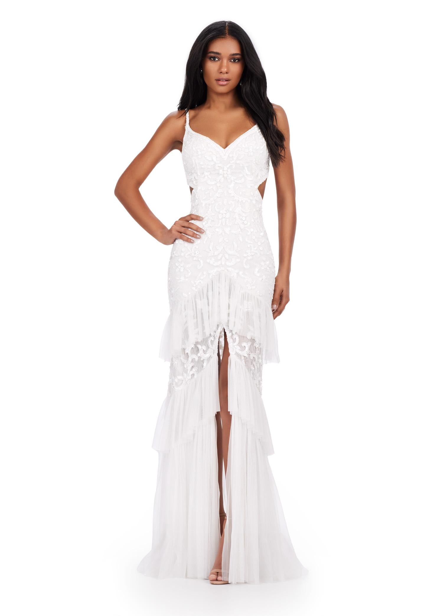 Front view. ASHLEYlauren 11436 White fully beaded gown with V-neckline, long sleeves, open back, centre slit, and tiered ruffle skirt