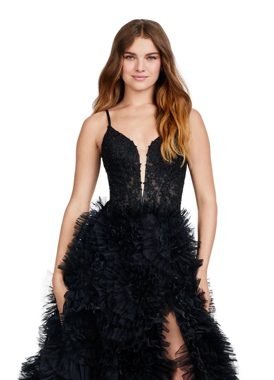 Front view. ASHLEYlauren 11446 black tulle gown with ruffled A-line skirt, corset bustier, deep illusion V-neckline, and leg slit