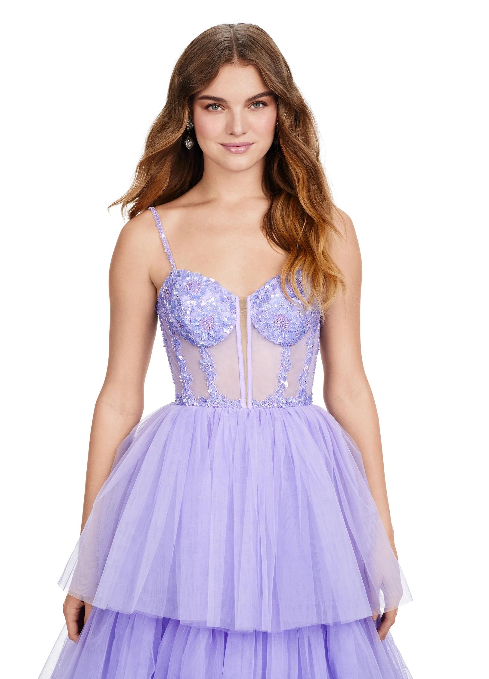 Front view. ASHLEYlauren 11462 lilac tiered tulle ball gown with sheer beaded corset bodice and spaghetti straps