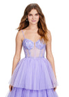 Front view. ASHLEYlauren 11462 lilac tiered tulle ball gown with sheer beaded corset bodice and spaghetti straps
