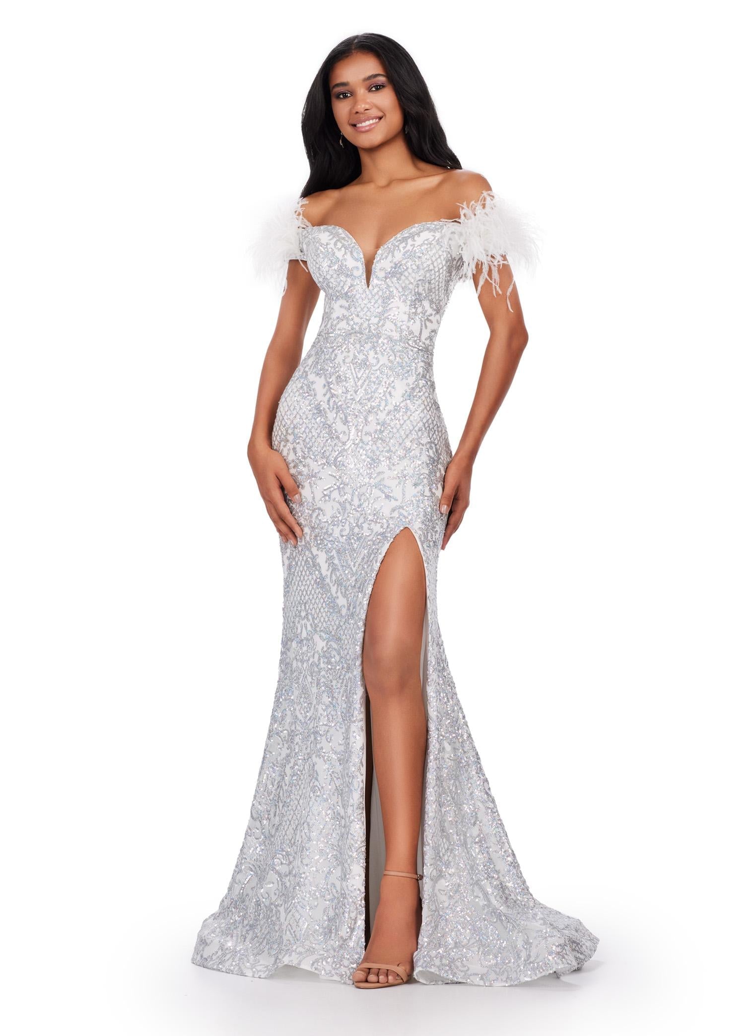 Front view. ASHLEYlauren 11463 Silver/Ivory sequin gown with sweetheart neckline, feather off shoulder straps, and left leg slit
