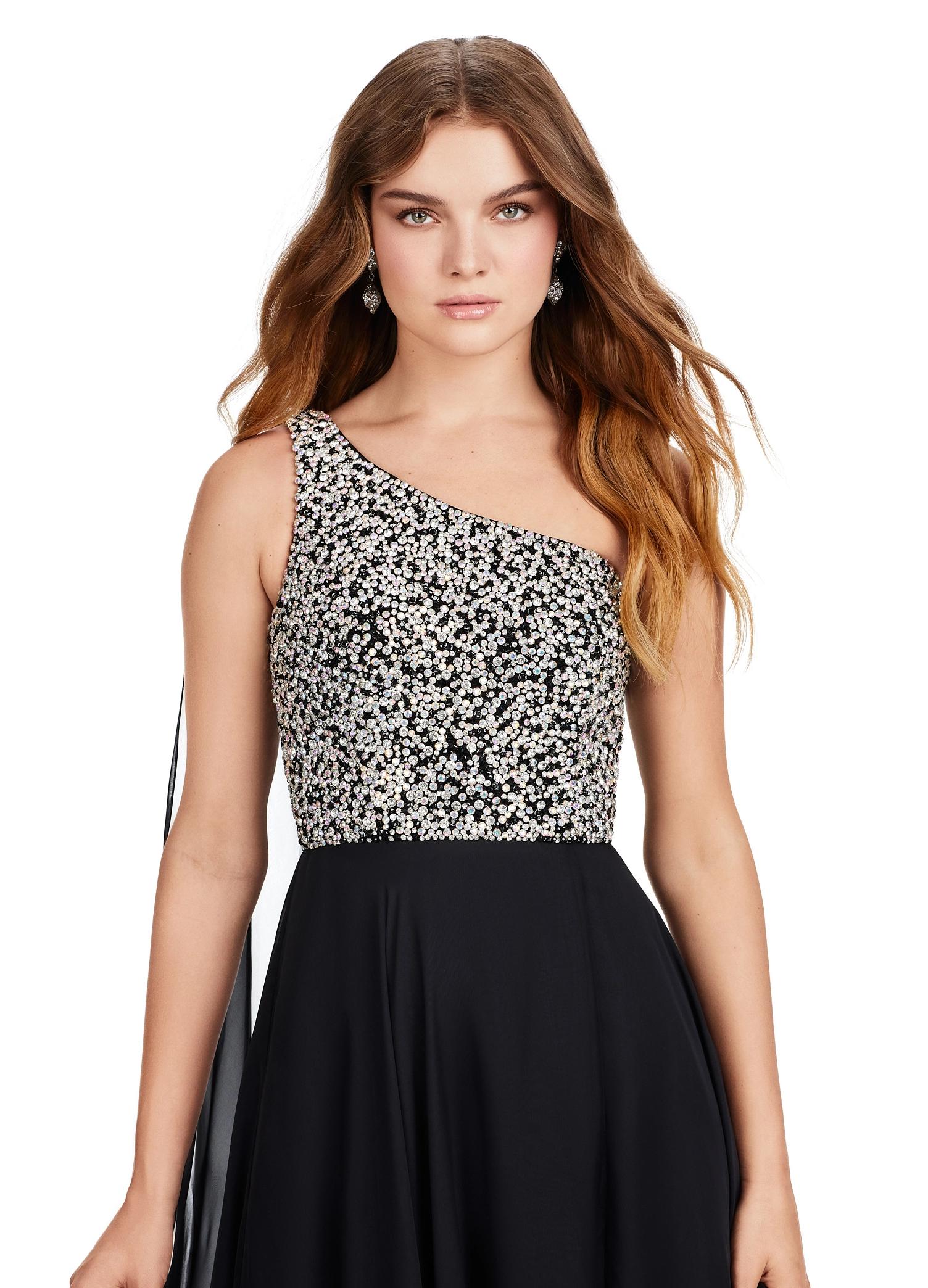 Front view. ASHLEYlauren 11482 black one shoulder gown with fully beaded bodice, chiffon cape, A-line skirt, and leg slit