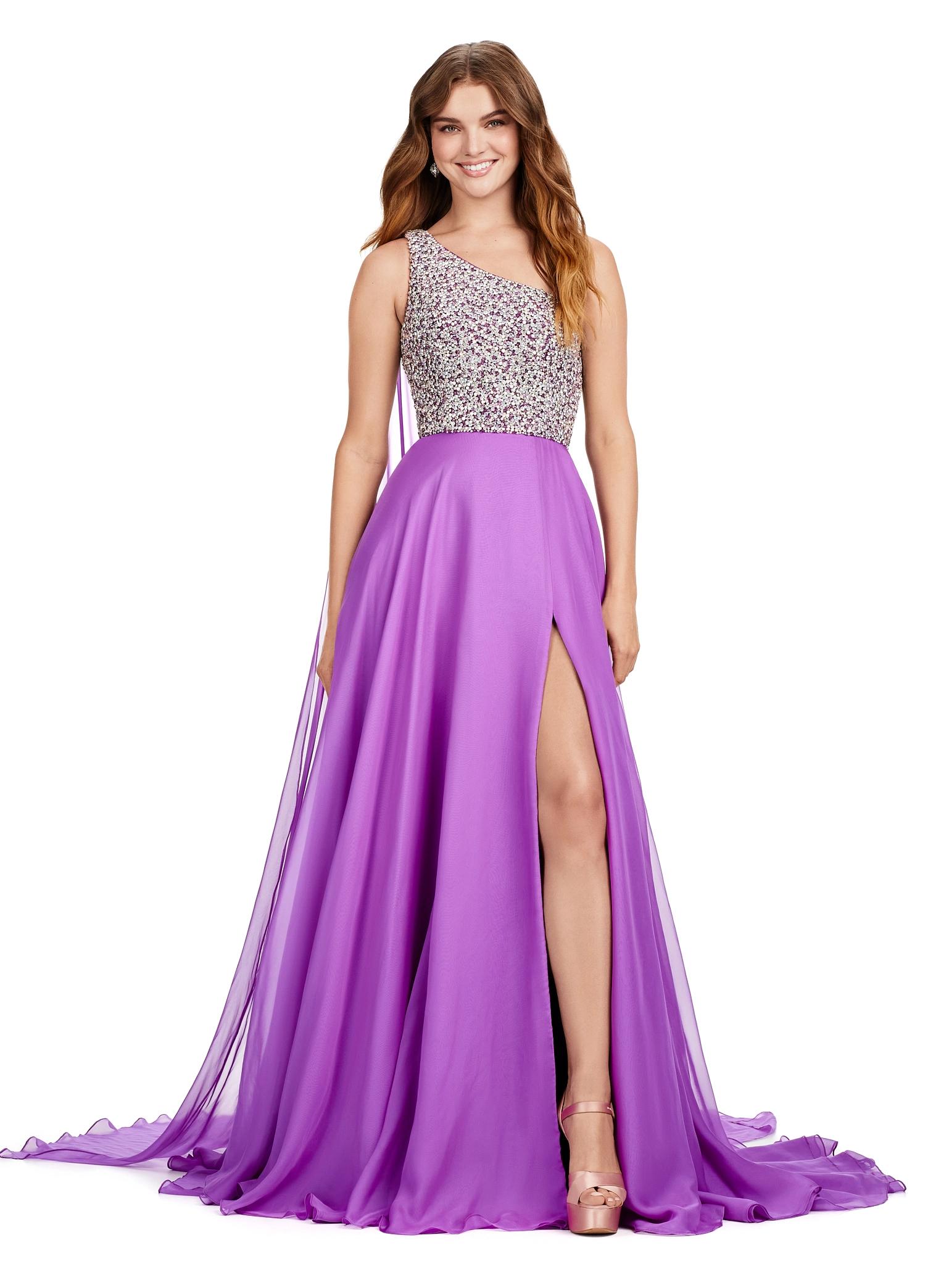 Front view. ASHLEYlauren 11482 purple one shoulder gown with fully beaded bodice, chiffon cape, A-line skirt, and leg slit