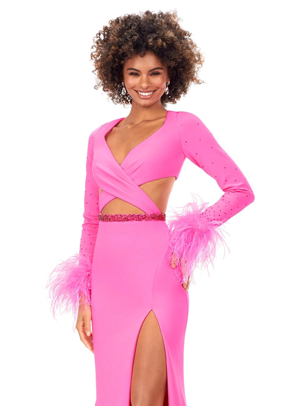 Front view. Hot Pink ASHLEYlauren 11308 striking scuba gown featuring a deep V-neckline, criss-cross cut out bodice, crystal waistline, long sleeves adorned with heat-set stones and feather trim, a fitted skirt, and a left leg slit for a bold and glamorous statement look.