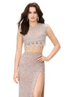 Front view. Nude ASHLEYlauren 11282 glamorous two-piece fully sequin gown featuring a crew neckline, cap sleeves, intricate bead pattern draping from the bustier, and a fitted skirt with a left leg slit for a vintage-inspired, show-stopping look.