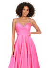Front view. Pink ASHLEYlauren 11267 stunning A-line gown featuring delicate spaghetti straps, a sweetheart neckline, eye-catching crystal trim, and asymmetrical ruching on the bustier to accentuate your curves for a glamorous and sophisticated look.