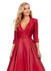 Front view. Red ASHLEYlauren 11326 Elegant Phantom Satin Ball Gown with V-Neckline, Wrap Lapel Detail, Buckled Waist Belt, Full Skirt, and Hidden Pockets