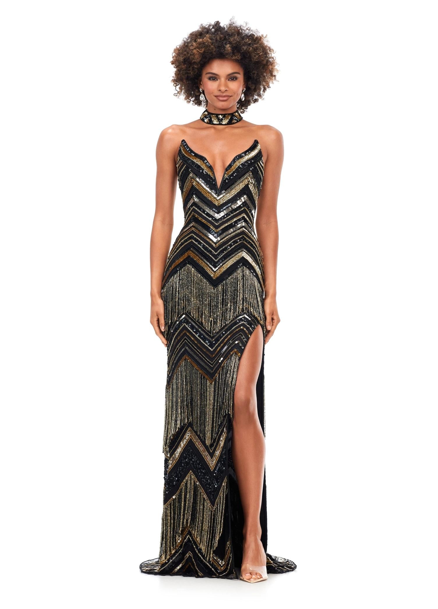 Gold/Black ASHLEYlauren 11259 art deco-inspired gown featuring a strapless bustier with built-in corset, intricate bead pattern, cascading fringe accents, left leg slit, and a beaded neck collar for a striking and elegant look.