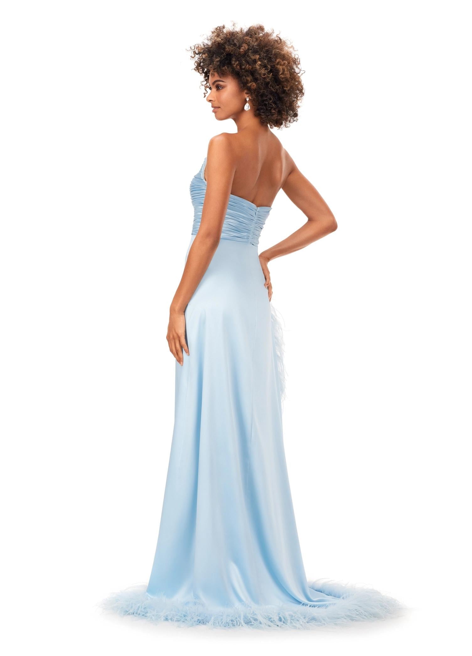 Back -  Ice Blue ASHLEYlauren 11313 strapless satin gown featuring a ruched bustier, slight A-line skirt, high right leg slit, and cascading feather trim along the hemline.