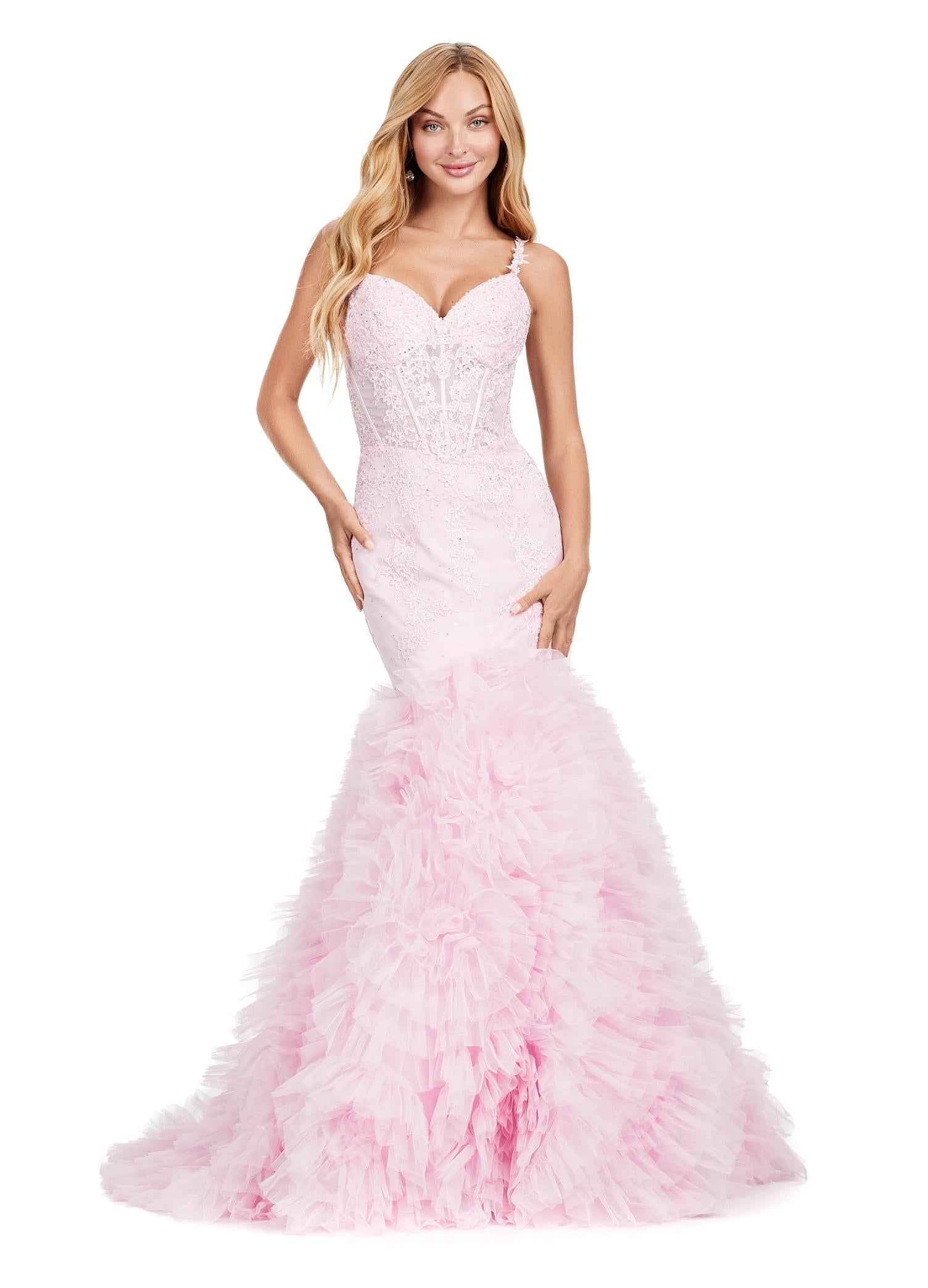 Ice pink ASHLEYlauren 11475 mermaid gown with exposed corset bodice, lace detailing, and dramatic ruffled tulle trumpet skirt