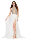 Ivory ASHLEYlauren 11248 – A stunning chiffon A-line gown featuring a beaded halter top with crystal details, an illusion cut-out, and a high left leg slit. Perfect for shining bright and making a statement at any special event.