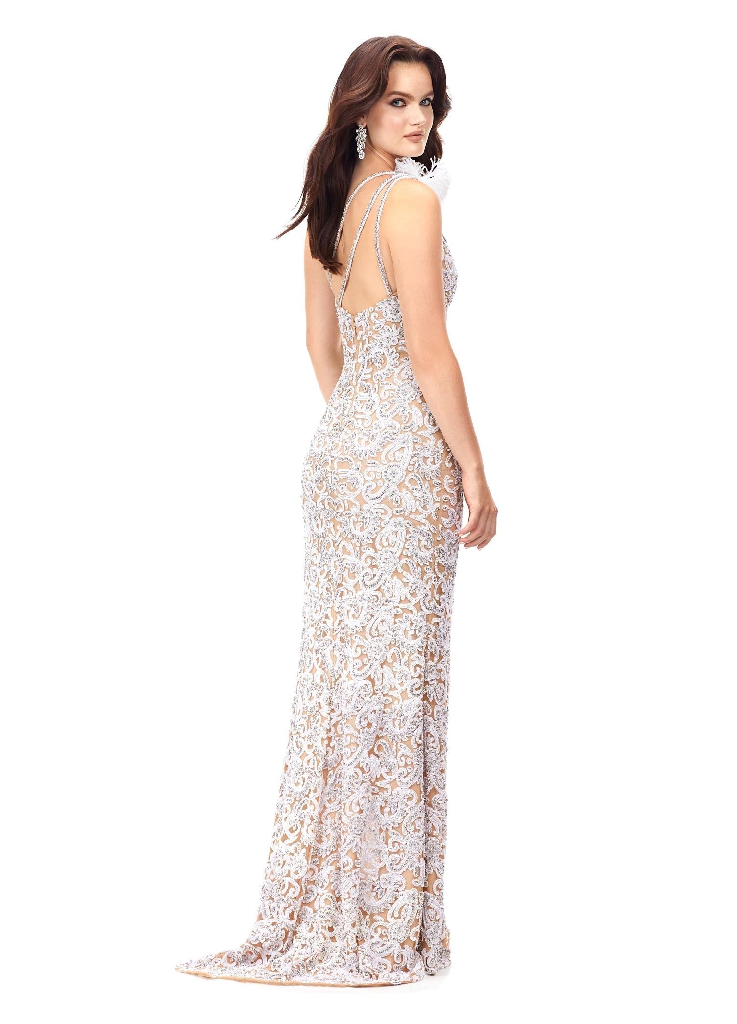 Back - Ivory ASHLEYlauren 11277 one shoulder gown featuring intricate sequin and crystal beading, feather-accented neckline, left leg slit, and strappy open back.