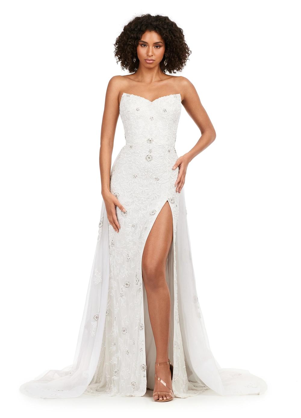 Ivory ASHLEYlauren 11405 strapless gown featuring a sweetheart neckline, fully sequined design, glimmering beadwork, full tulle overskirt, and left leg slit for added elegance.