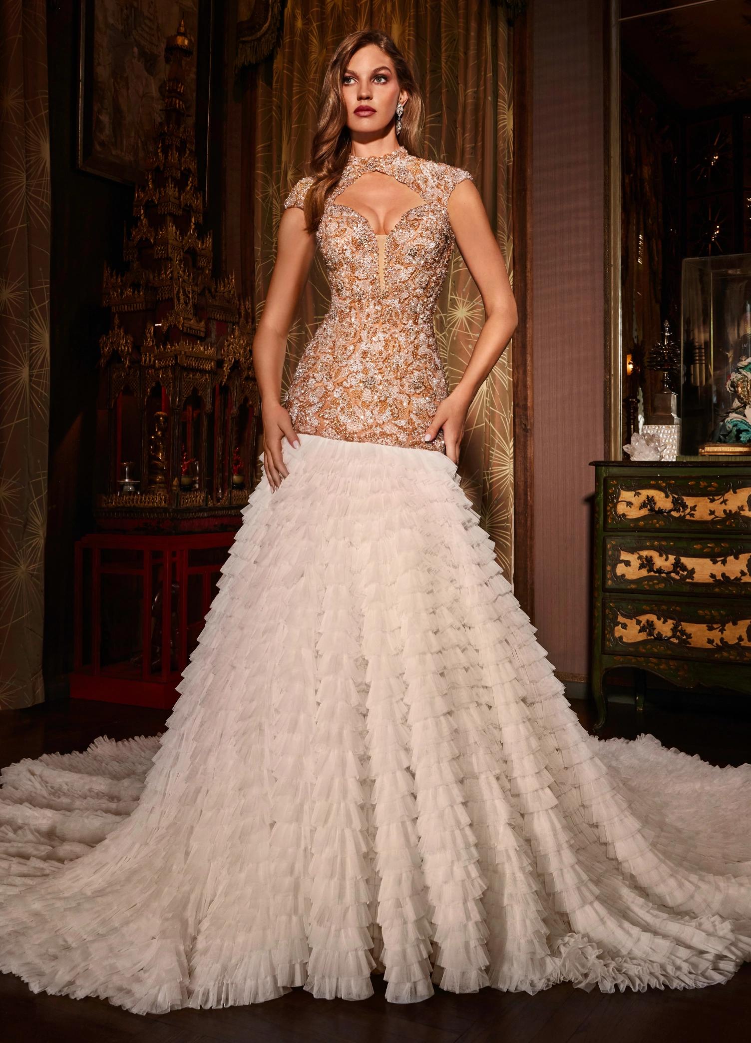 Ivory ASHLEYlauren 11428 breathtaking mermaid gown featuring a fully beaded drop waist bustier, open back, cap sleeves, and a dramatic tiered ruffle tulle skirt for an unforgettable look.