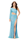 Light Blue ASHLEYlauren 11340 sequin one shoulder gown featuring a single sleeve, shark bite cut-out, wrap skirt, and left leg slit for a striking and glamorous look.