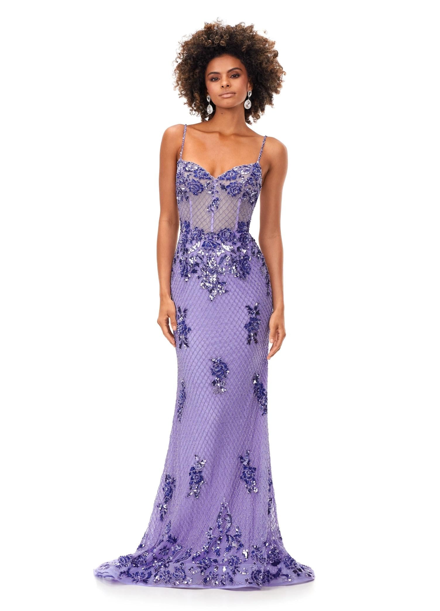 Lilac ASHLEYlauren 11362 elegant spaghetti strap gown featuring a sweetheart neckline, sheer illusion bustier adorned with intricate sequin details that cascade onto the skirt and hemline, and a sweep train for a glamorous and sophisticated look.