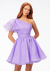 Lilac ASHLEYlauren 4524 organza cocktail dress featuring a one shoulder neckline with a flutter sleeve, an A-line skirt with a wire hem for added structure, and a playful, sassy vibe.