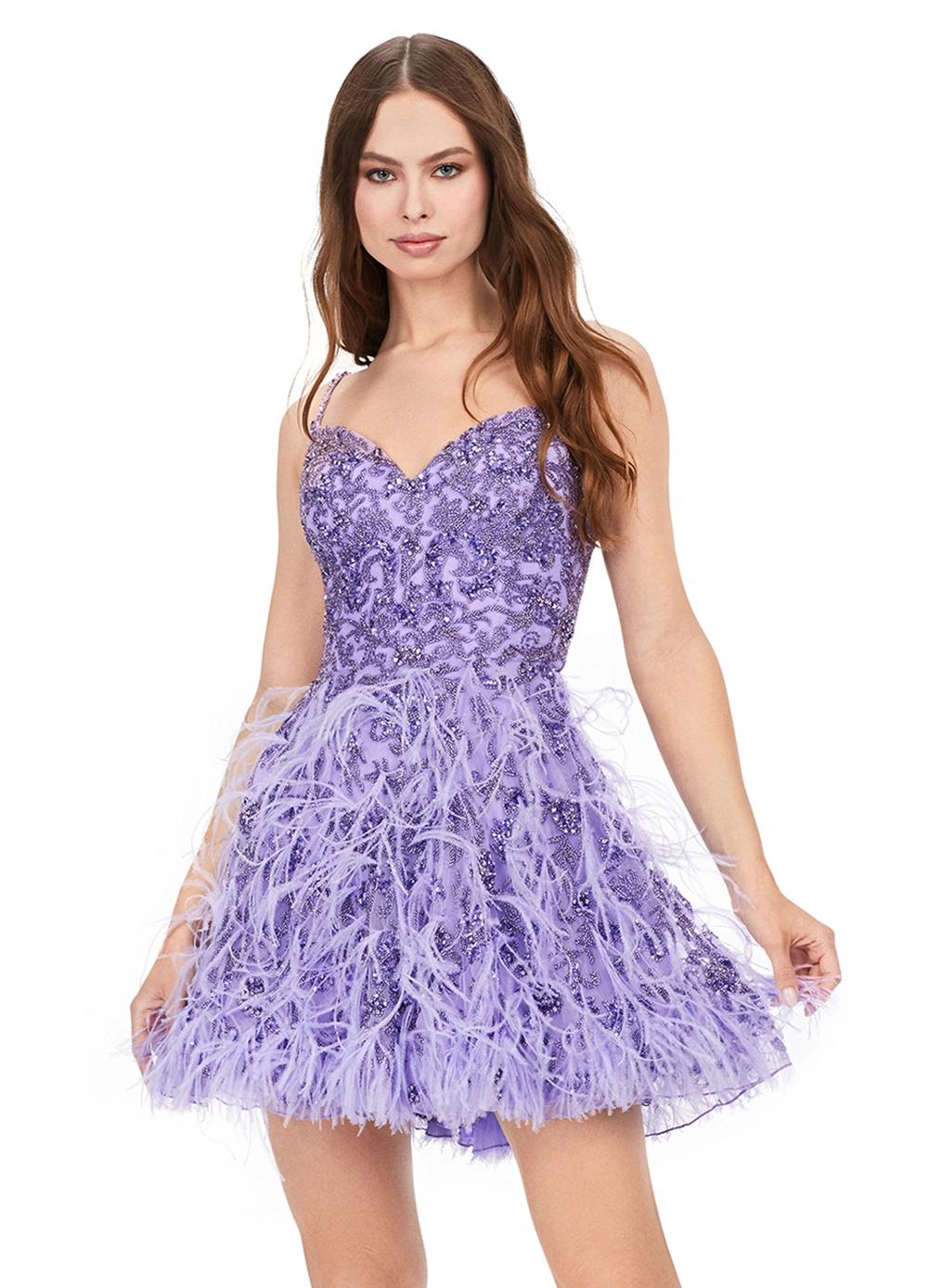 Lilac ASHLEYlauren 4604 – A fabulous cocktail dress featuring intricate beading throughout, a sweetheart neckline, spaghetti straps, and an A-line skirt adorned with feather details. Perfect for turning heads on the dance floor or stage.