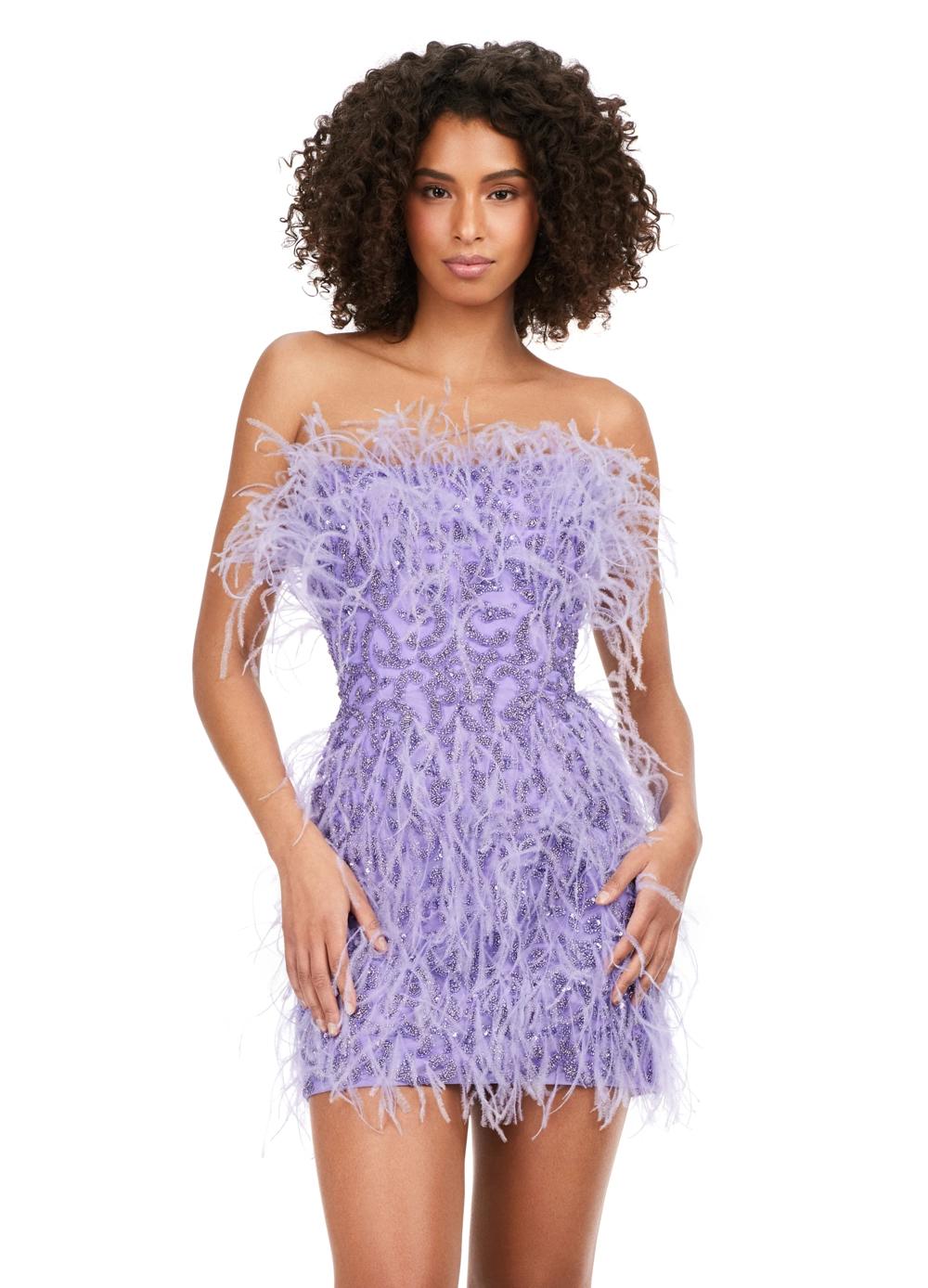 Lilac ASHLEYlauren 4615 – A stunning, fully beaded strapless cocktail dress featuring feather details and a fitted skirt. Perfect for making a bold statement and feeling like royalty at any event.