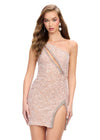 Nude ASHLEYlauren 4754 fully hand-beaded cocktail dress featuring a one shoulder neckline, asymmetrical cut out, open back, fitted skirt, and a left leg slit for a bold and glamorous look.