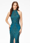 Peacock ASHLEYlauren 11177 – An intricately hand-beaded halter gown featuring a stunning beaded motif, low open back, center slit, and a sweeping train. Perfect for making a show-stopping statement at any event.