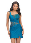Peacock ASHLEYlauren 4691 one shoulder cocktail dress featuring a fully beaded corset bustier with press-on stones, a wrap skirt, and a left leg slit for an elegant and glamorous look.