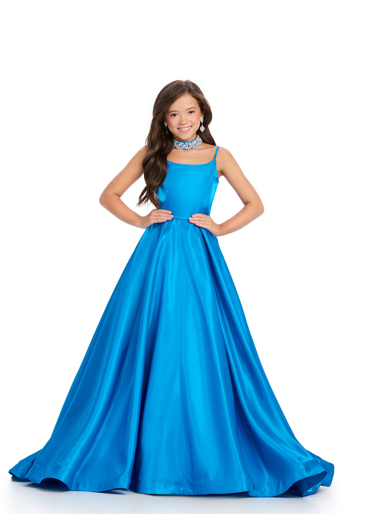 Peacock ASHLEYlauren 8275 elegant satin kids ball gown featuring delicate spaghetti straps, an A-line skirt, a matching fully beaded choker, and a sweep train for a timeless and sophisticated look.