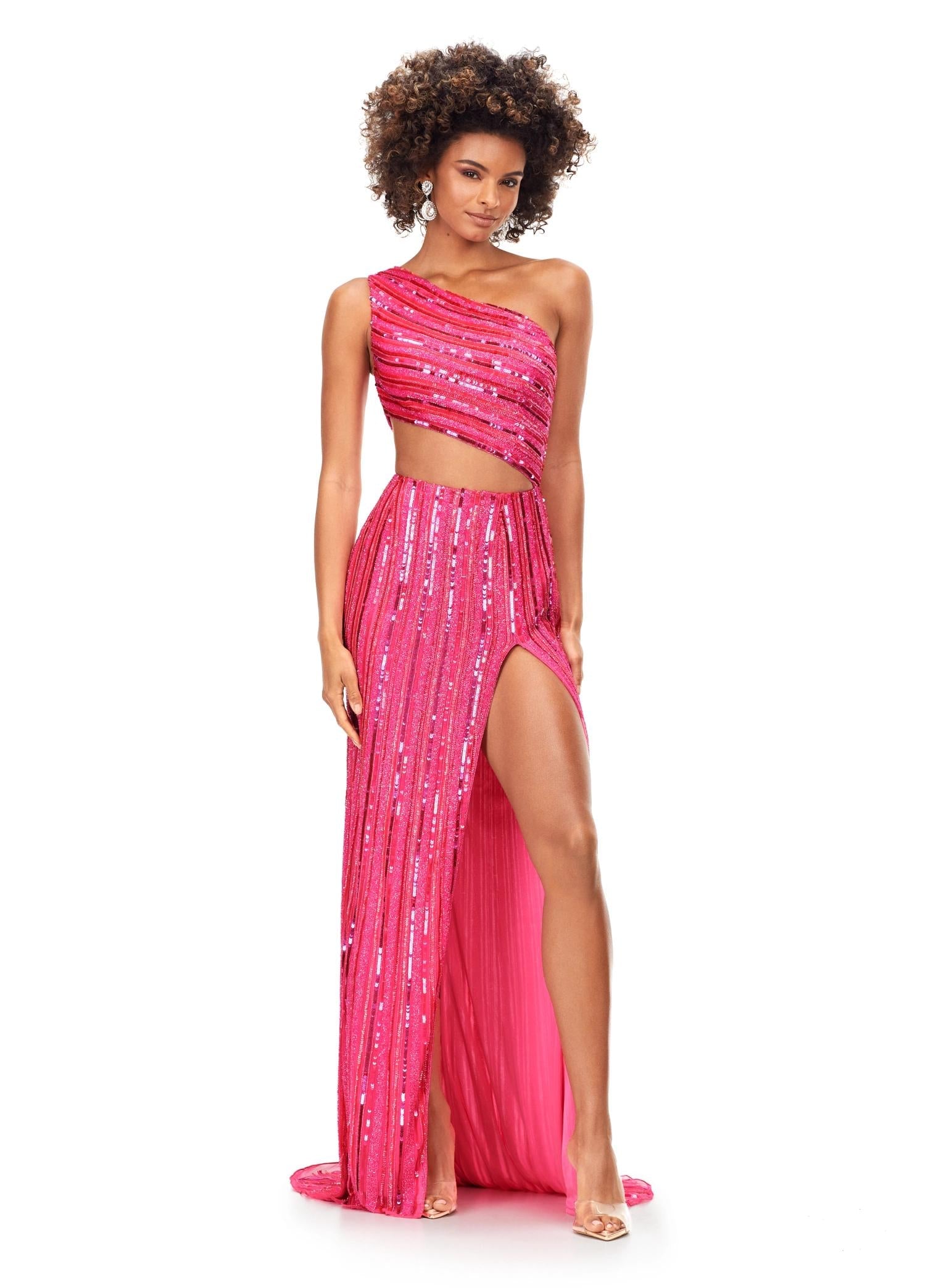 Pink ASHLEYlauren 11240 fully hand-beaded one shoulder gown featuring an intricate bead pattern designed to accentuate curves, a bold cut out detail, and a left leg slit for a striking and glamorous look.
