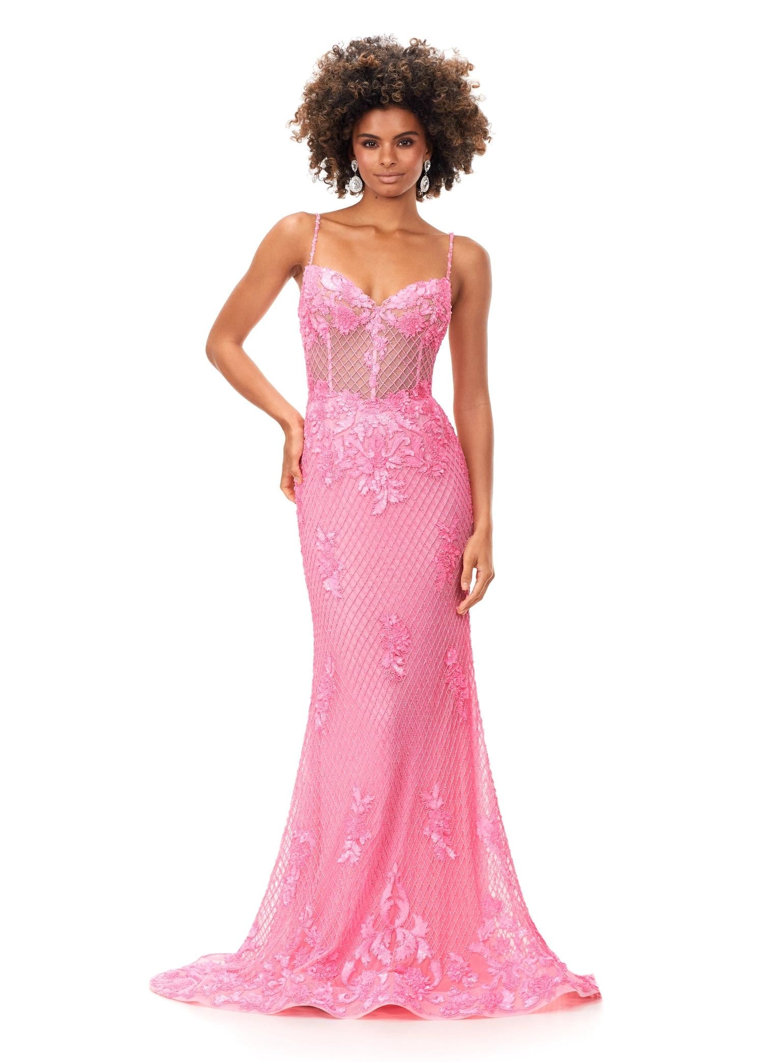 Pink ASHLEYlauren 11362 elegant spaghetti strap gown featuring a sweetheart neckline, sheer illusion bustier adorned with intricate sequin details that cascade onto the skirt and hemline, and a sweep train for a glamorous and sophisticated look.