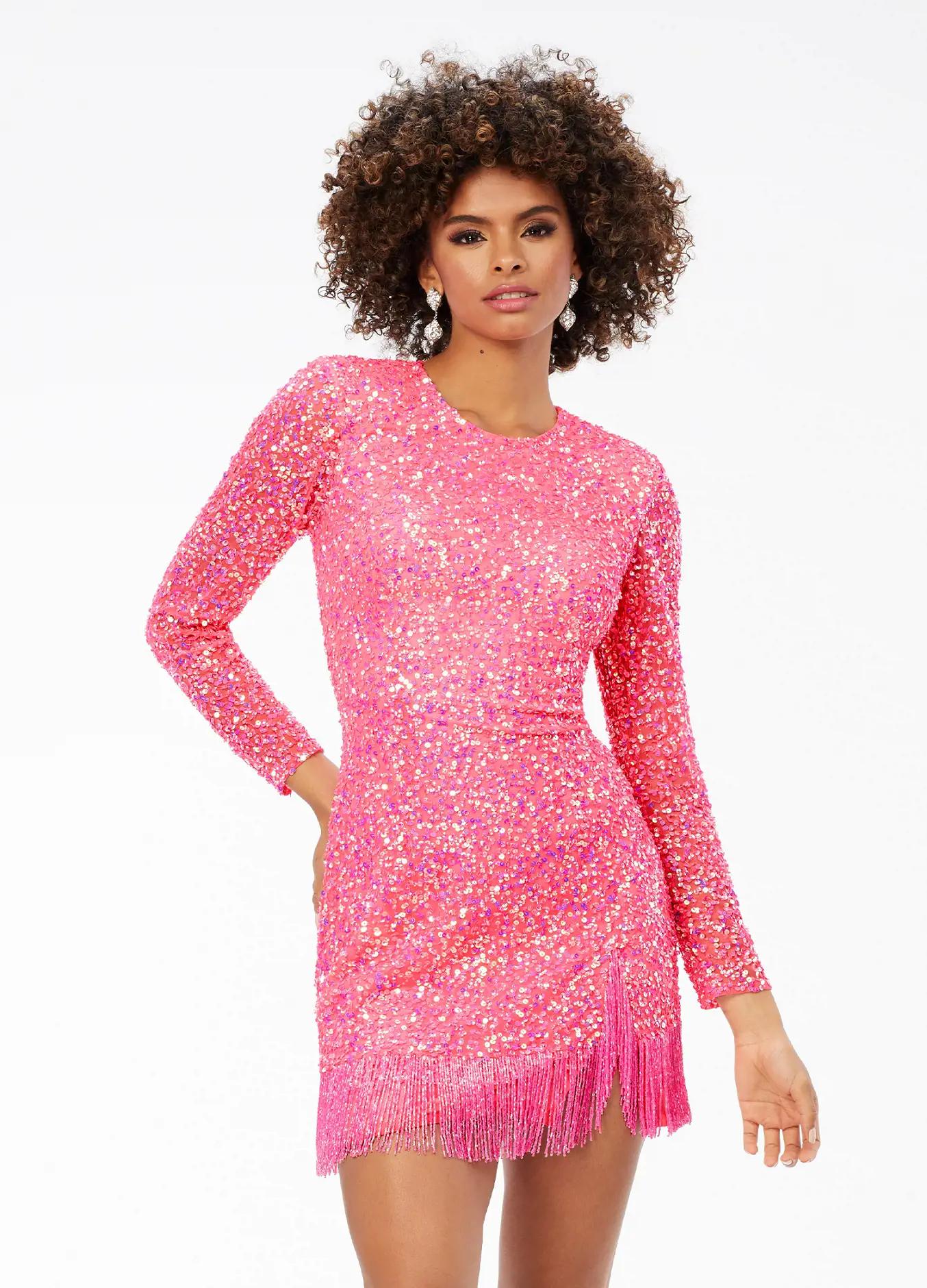 ASHLEYlauren 4438 – A sassy and classy fully hand-beaded long sleeve cocktail dress featuring a fitted skirt with fringe detail along the left leg slit and hemline. Perfect for making a bold, elegant statement at any event.