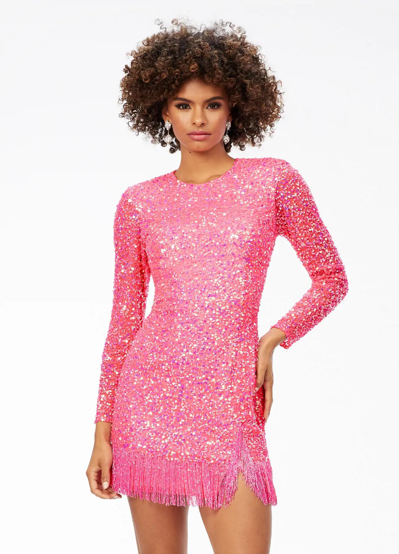 ASHLEYlauren 4438 – A sassy and classy fully hand-beaded long sleeve cocktail dress featuring a fitted skirt with fringe detail along the left leg slit and hemline. Perfect for making a bold, elegant statement at any event.