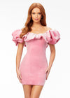 Pink ASHLEYlauren 4528 off shoulder stretch velvet cocktail dress featuring an oversized ruffle detail and contoured seaming throughout the fitted skirt for a chic, curve-enhancing look.