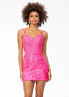 Pink ASHLEYlauren 4541 lace cocktail dress featuring delicate spaghetti straps, scattered lace appliques, heat set stones, a fitted skirt, and a lace-up back for an elegant and refined look.