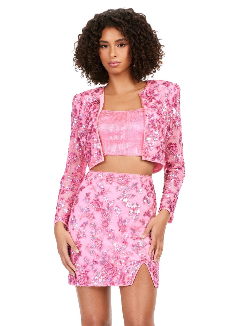 Pink ASHLEYlauren 4618 three piece set featuring a fully liquid beaded crop top, intricately beaded jacket, and a fitted skirt with a slit for a bold and fashionable statement look.