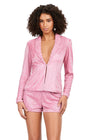 Pink ASHLEYlauren 4632 fully liquid beaded two-piece romper featuring a V-neckline, crystal and chunky stone-embellished lapel, and a bold, statement-making design perfect for any glamorous event.