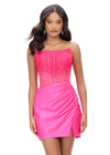 Pink ASHLEYlauren 4686 strapless cocktail dress featuring a corset bustier embellished with press-on stones, a sleek jersey skirt, and a left leg slit for a classic and glamorous look.