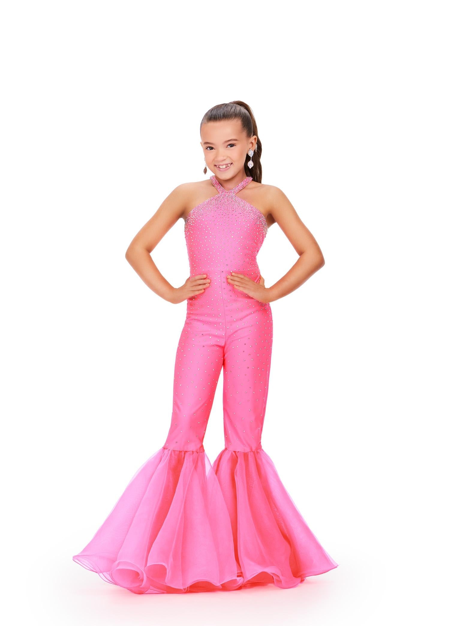 Pink ASHLEYlauren 8265 super sassy kids jersey jumpsuit featuring a halter neckline, heat-set stone embellishments, and flared organza bell-bottom pant legs for a bold and stylish look.