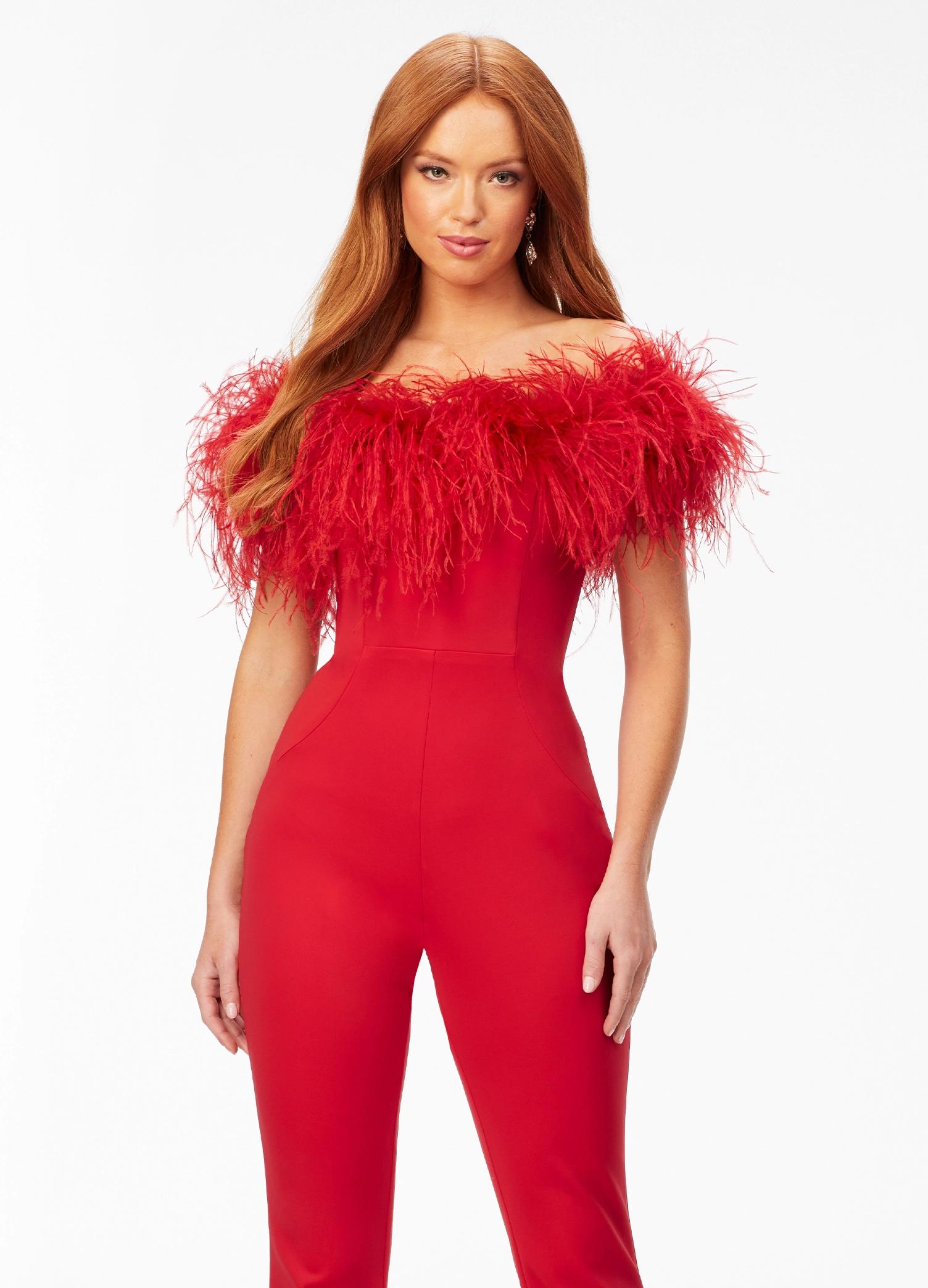 ASHLEYlauren 11100 – A flirty off-shoulder scuba jumpsuit featuring feather details along the neckline and flare pant legs. Perfect for making a stylish statement at your next event.