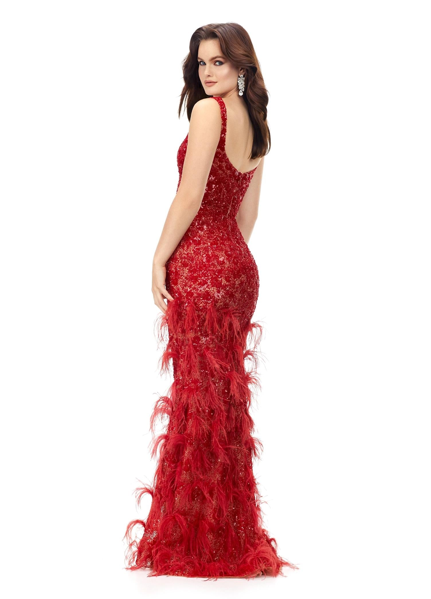 Back - Red ASHLEYlauren 11279 fitted gown featuring a deep illusion V-neckline, fully hand-beaded design, and feather accents throughout the skirt.